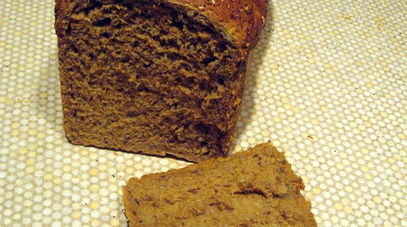 Multigrain country bread loaf crusted and filled with toasted sunflower, flax, and sesame seeds
