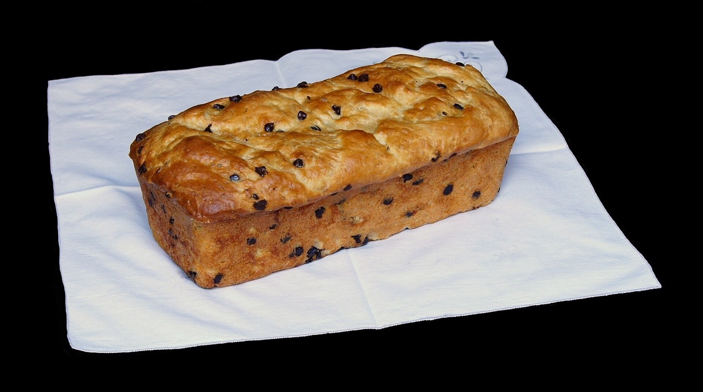Golden-brown French brioche loaf with rich butter-and-egg tender crumb