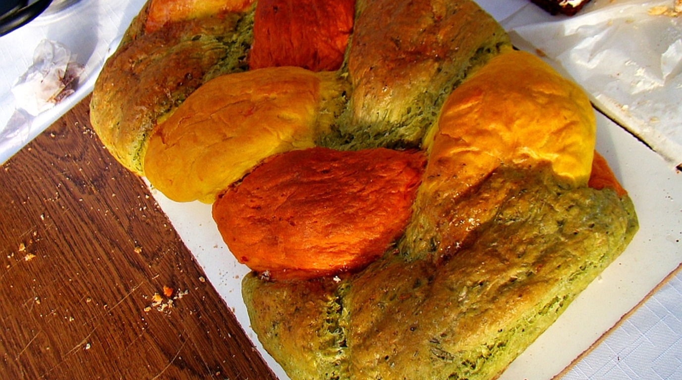 Artisan spelt grain bread loaf (Dinkelbrot) with crisp flour-dusted crust